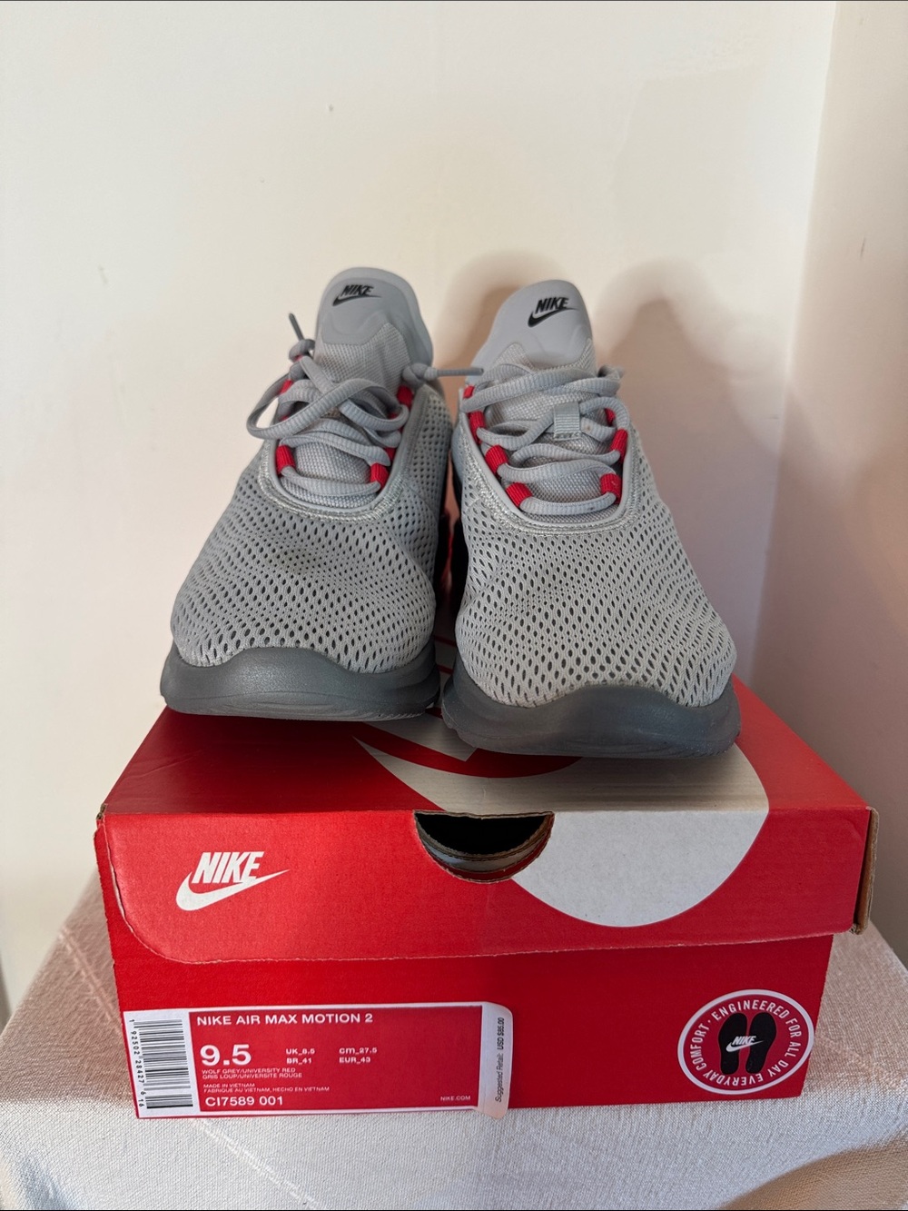 Nike Gray Sneakers with Red Accents
